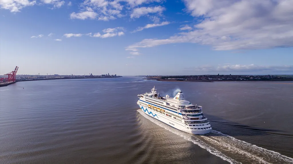 Cruise ship sailing out of port